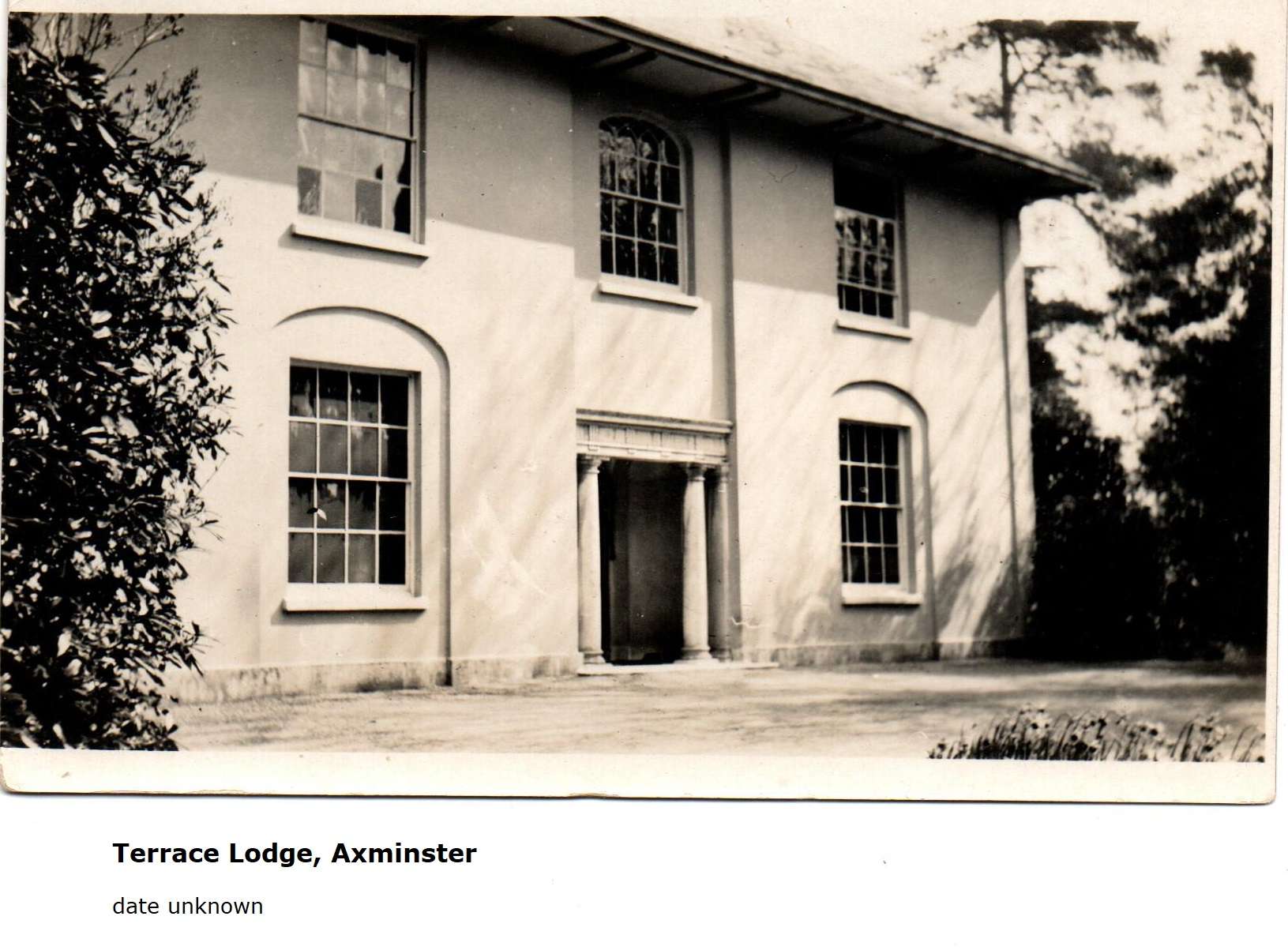The front of pippins community centre in sepia, many years ago